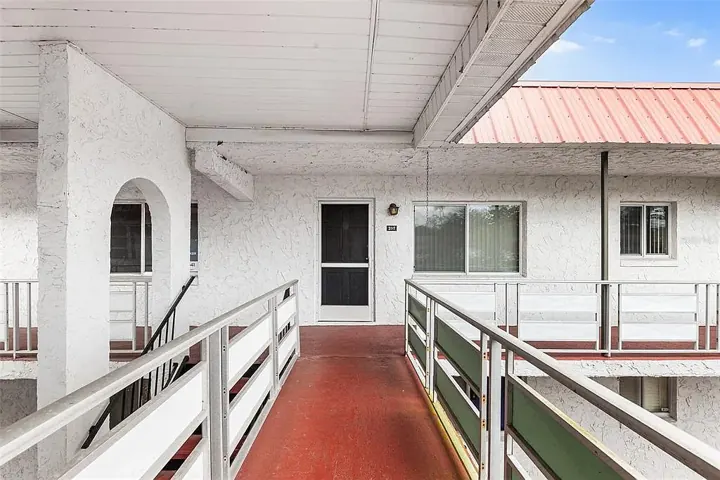 Upper-level walkway with white railings